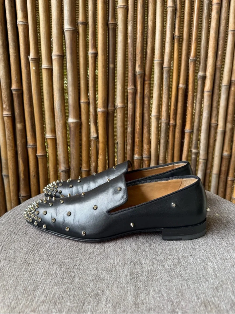 CHRISTIAN LOUBOUTIN men’s spiked leather loafers.